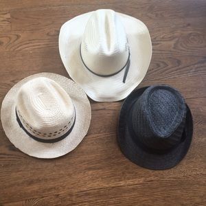 Straw Fedoras and cowboy hat